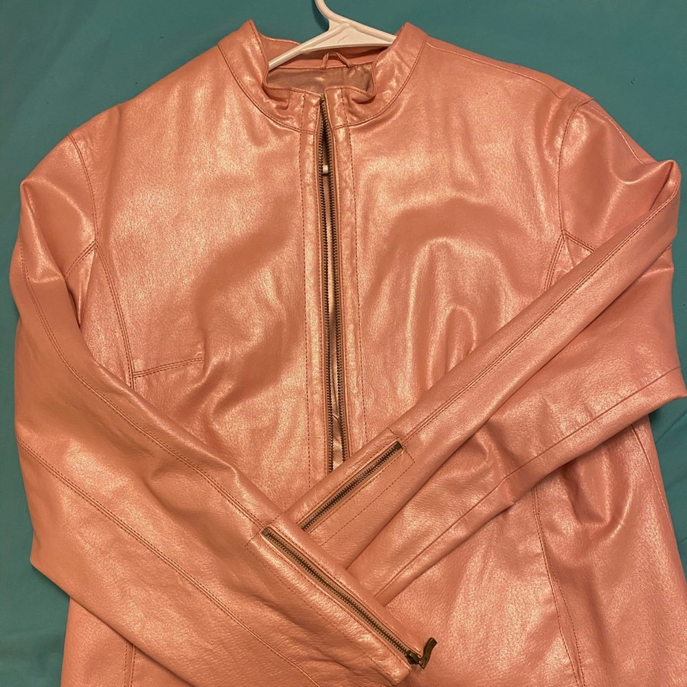 Shimmery pink leather jacket.